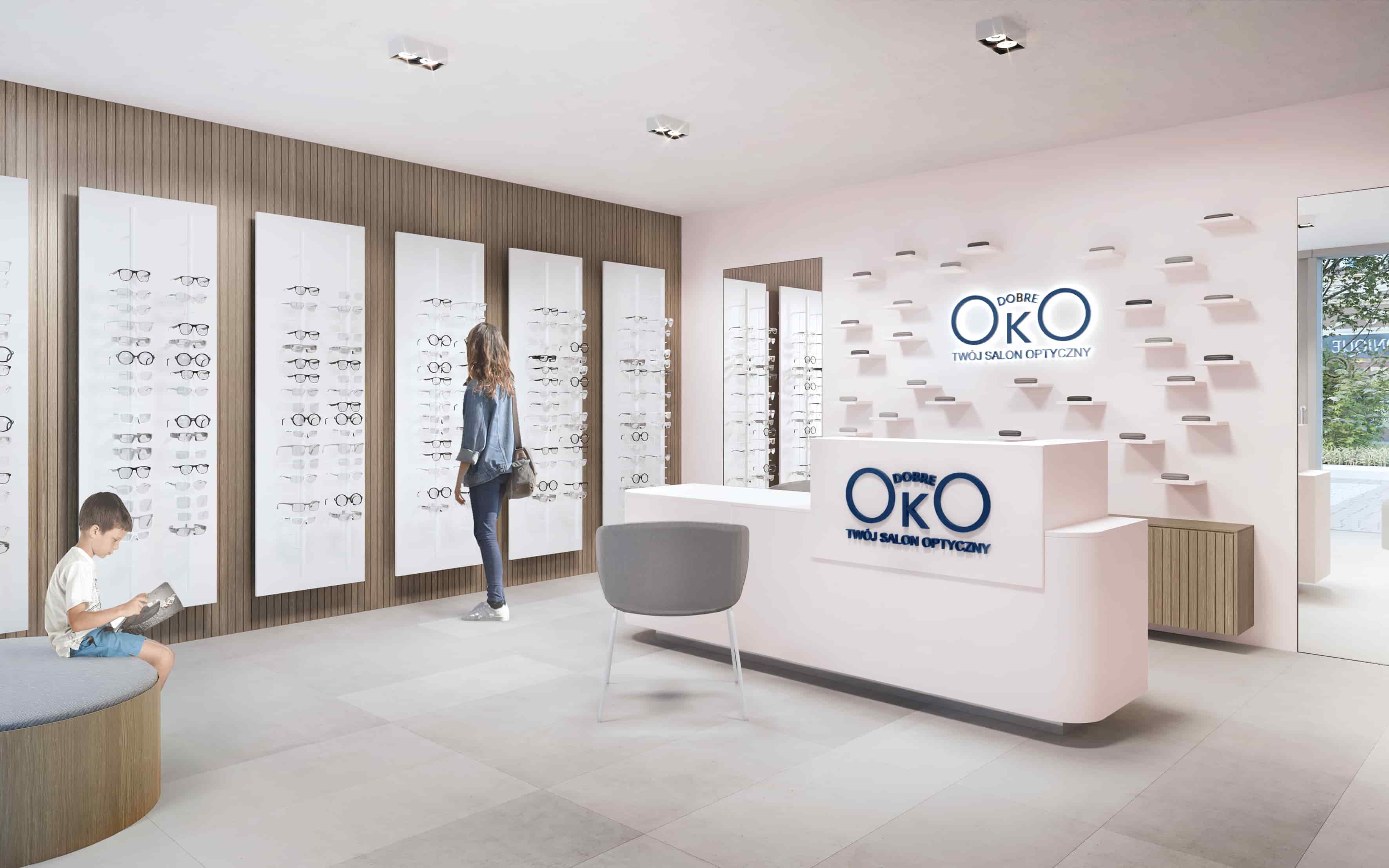 wewnątrz salonu optycznego, na sćianach wiszą okulary